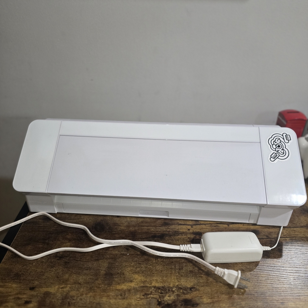 White Electronic Device with Power Cord